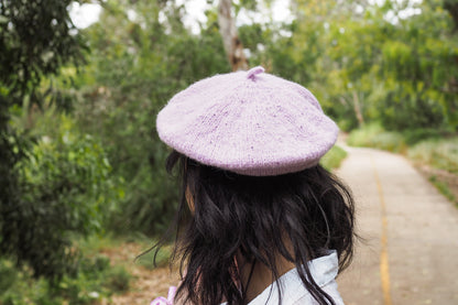 Purple Knit Beret seen from the back on a girl with black hair