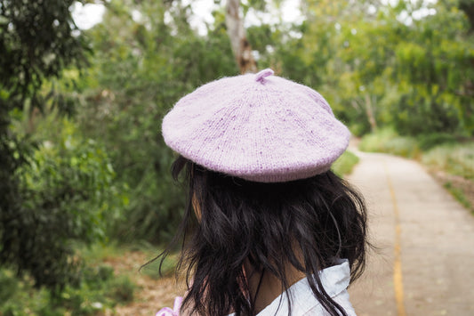 Purple Knit Beret seen from the back on a girl with black hair